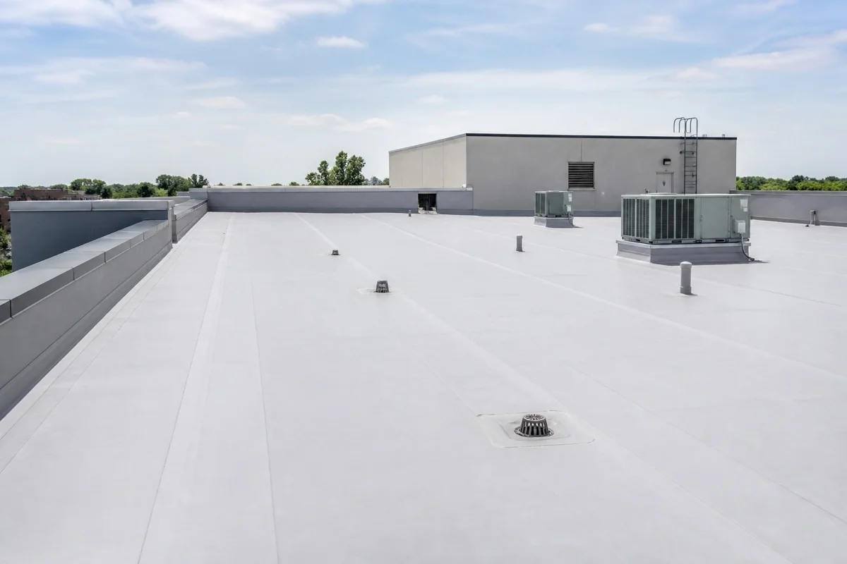 Completed low-slope membrane roofing system